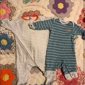 Gerber Sleepers. Size Newborn. One orange and white, one blue and white.